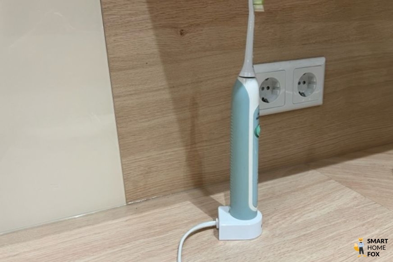 Slot for electric toothbrush.